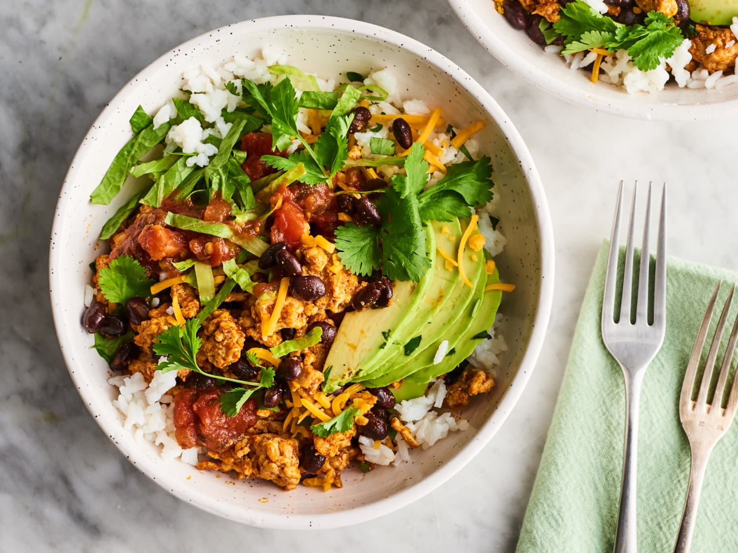 Turkey Burrito Bowls With Cilantro Lime Rice Recipe Kitchn Meanwhile, halve 1 medium lime and coarsely chop until you have 2 tablespoons cilantro. turkey burrito bowls with cilantro lime rice