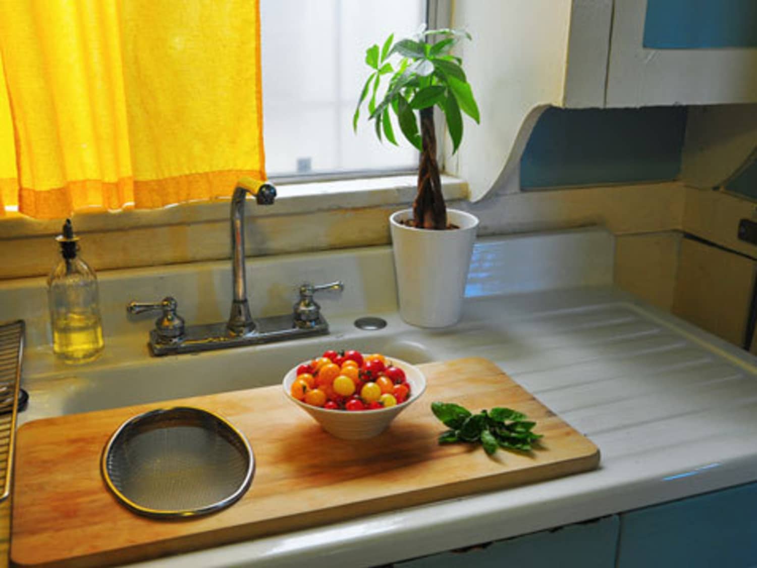 Reclaiming some counter space with under-cabinet cutting board