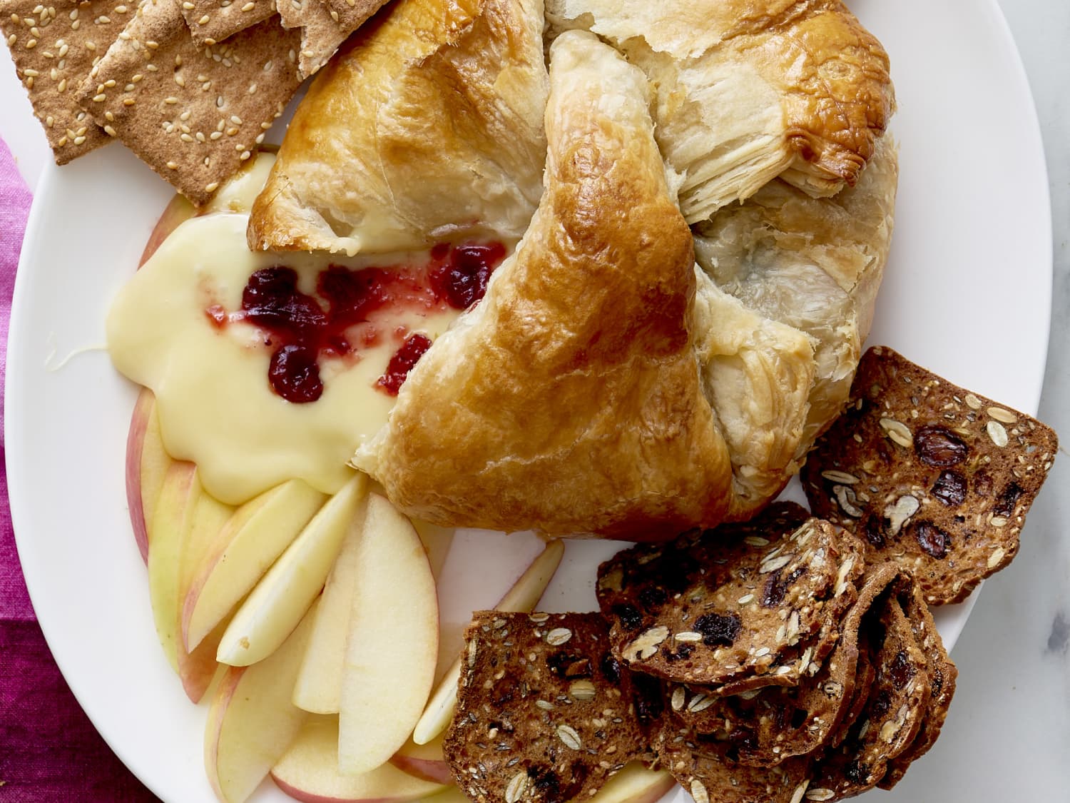 How To Make Baked Brie In Puff Pastry Kitchn Our baked brie is a heavenly pairing of savory melty brie with sweet fig jam and puff pastry that you can dig into and spread over apples or crackers. how to make baked brie in puff pastry