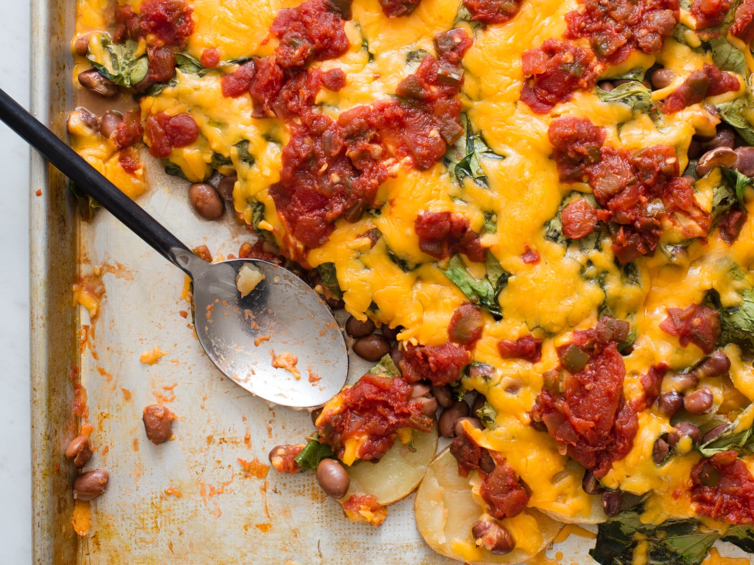 Sheet Pan Potato Nachos Kitchn Whether you prefer dried beans or canned, pinto beans should always be a staple in your pantry. potato nachos with pinto beans and spinach