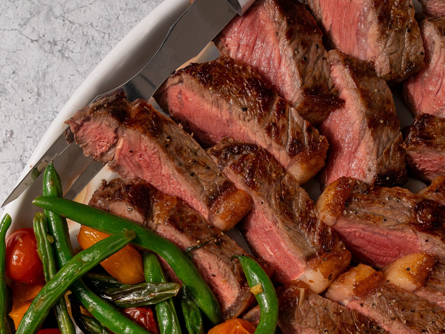 New York Strip Steak with Green Beans and Blistered Tomatoes