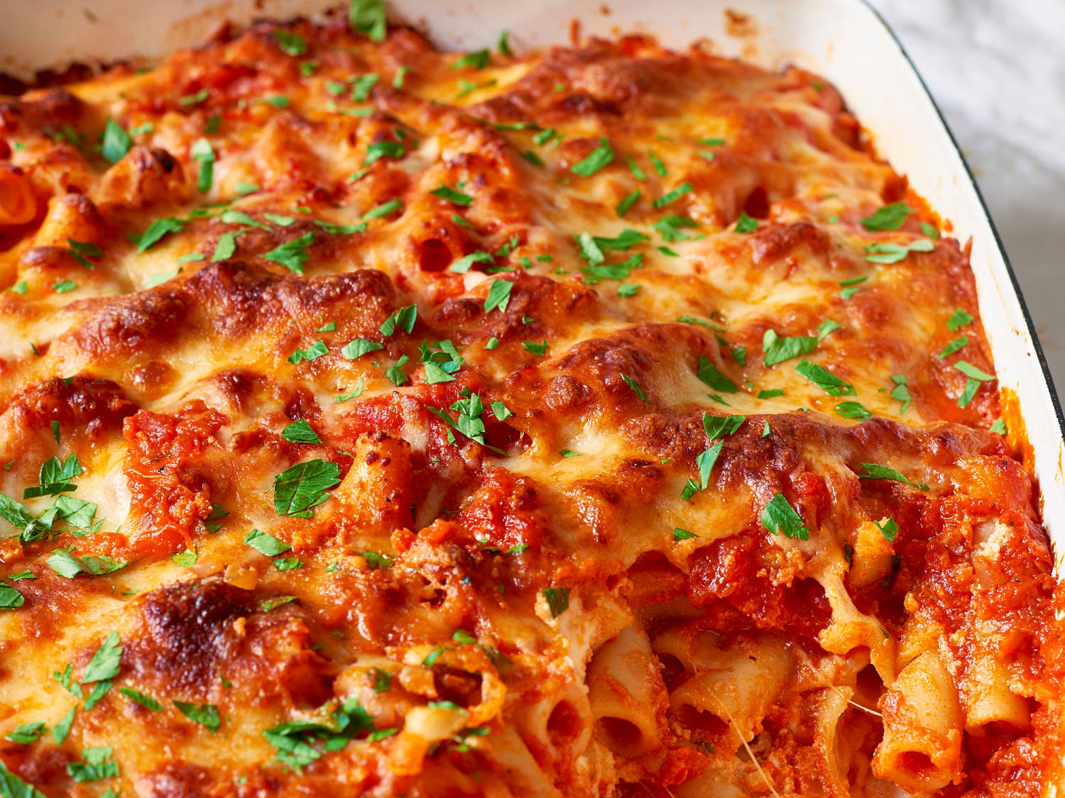 How To Make a Baked Ziti Pasta Dish Layered With Sauce and Cheese