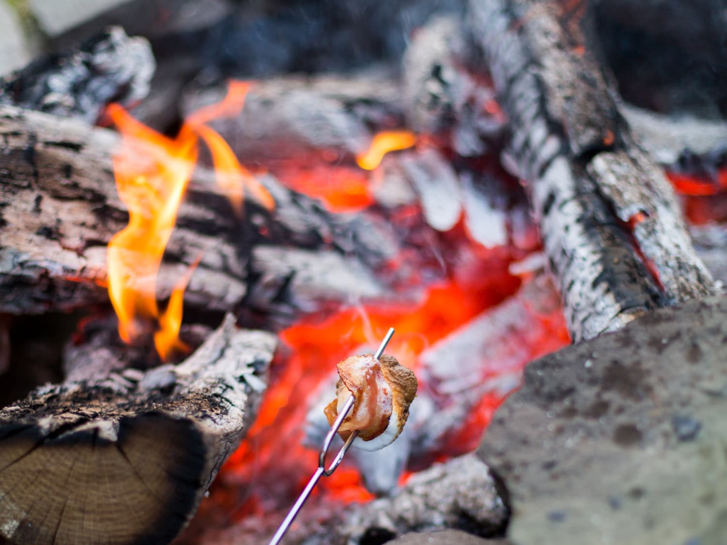 Cooking over outlet wood fire