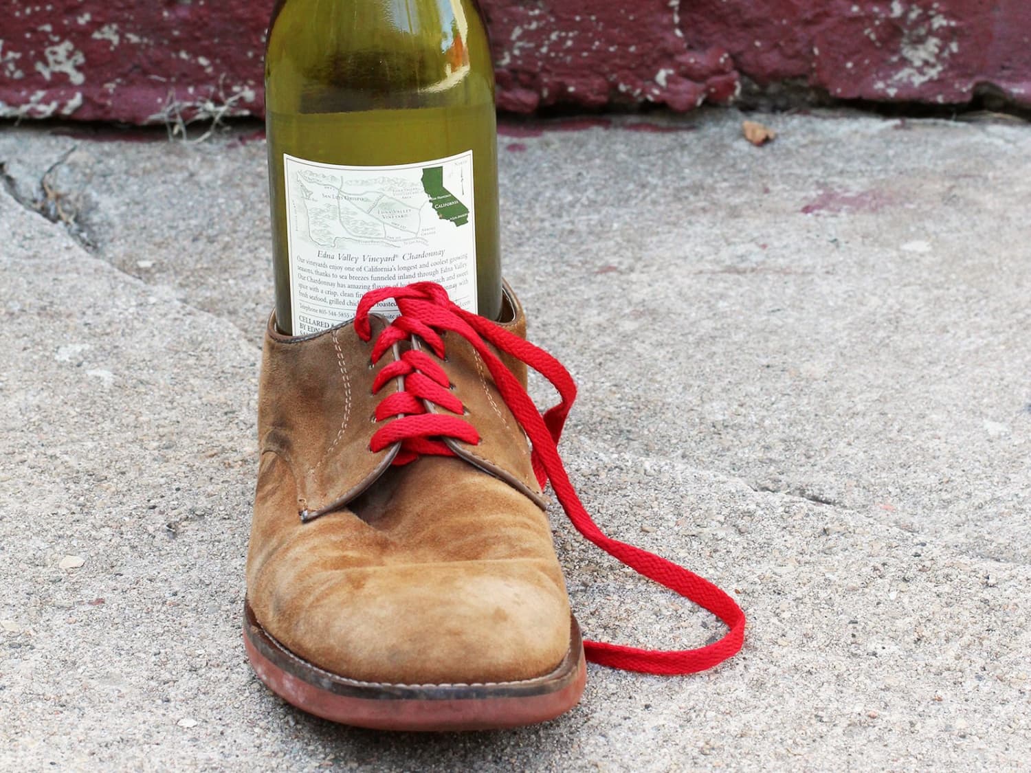Opening a wine bottle sales with a shoe
