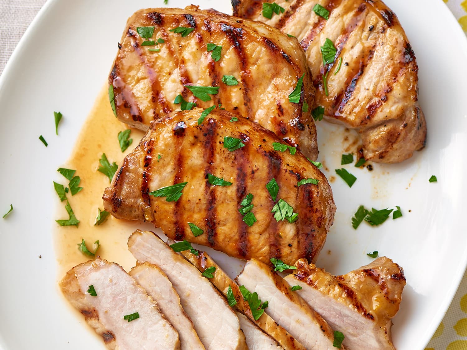 Grilled boneless pork chops top