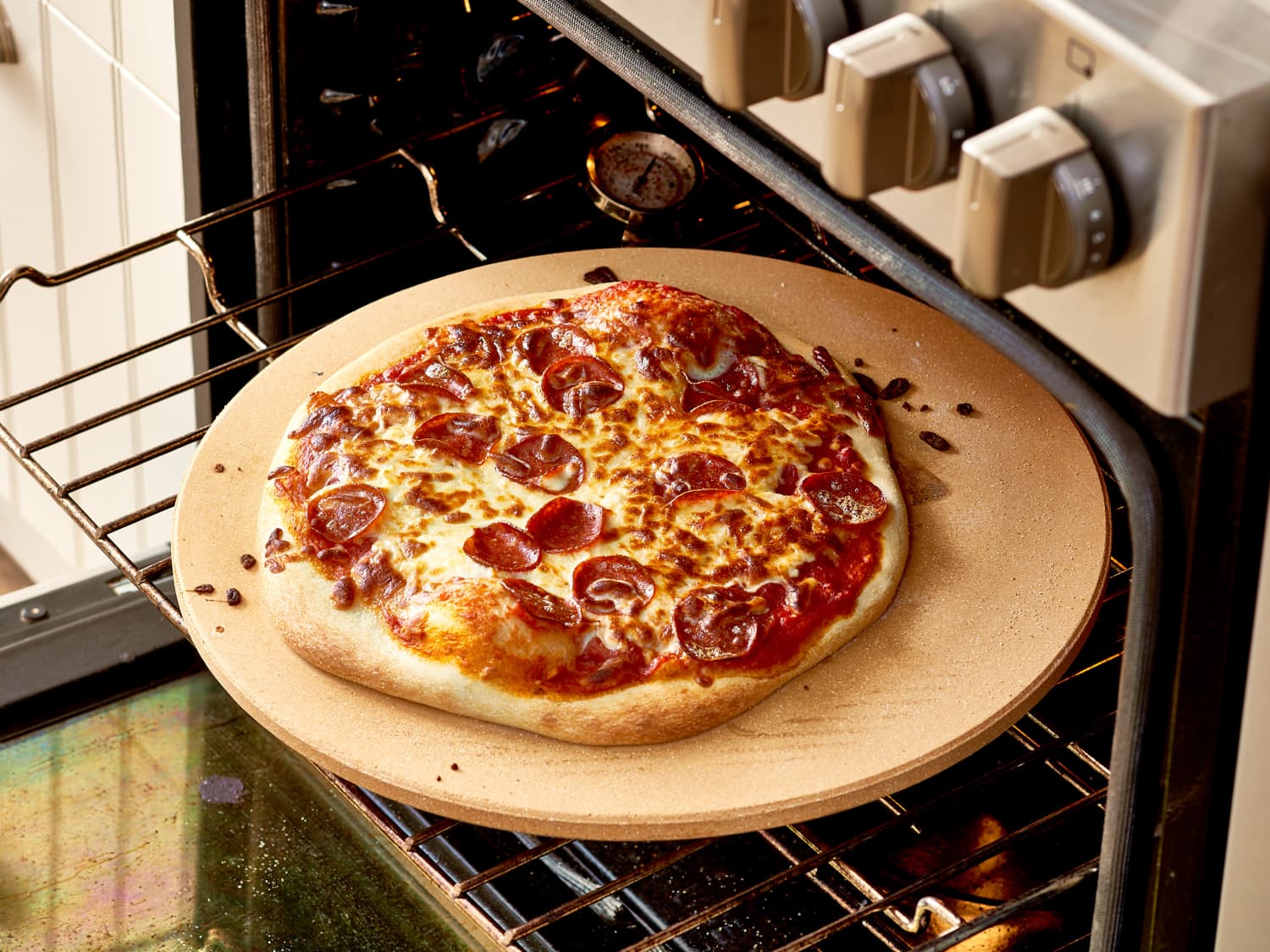 How to Clean a Pizza Stone So It Lasts Forever Photos Instructions The Kitchn
