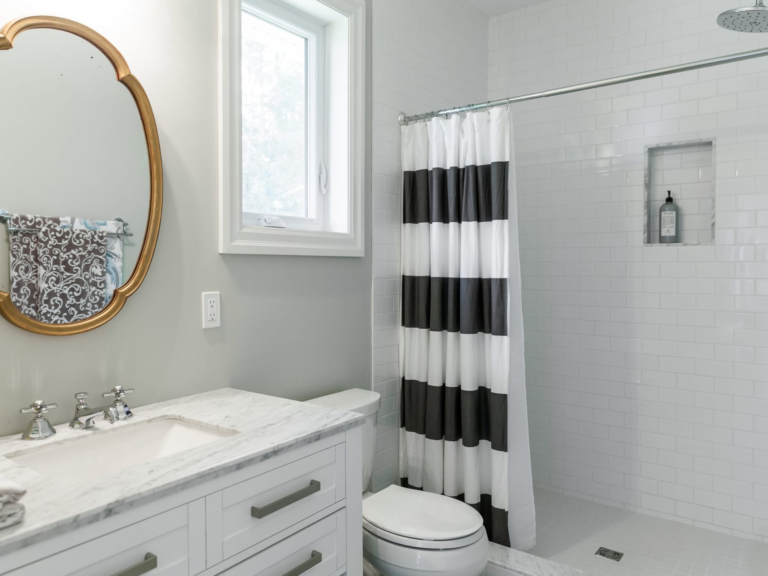Bathroom Organizing Tip Using Two Shower Curtain Rods ...