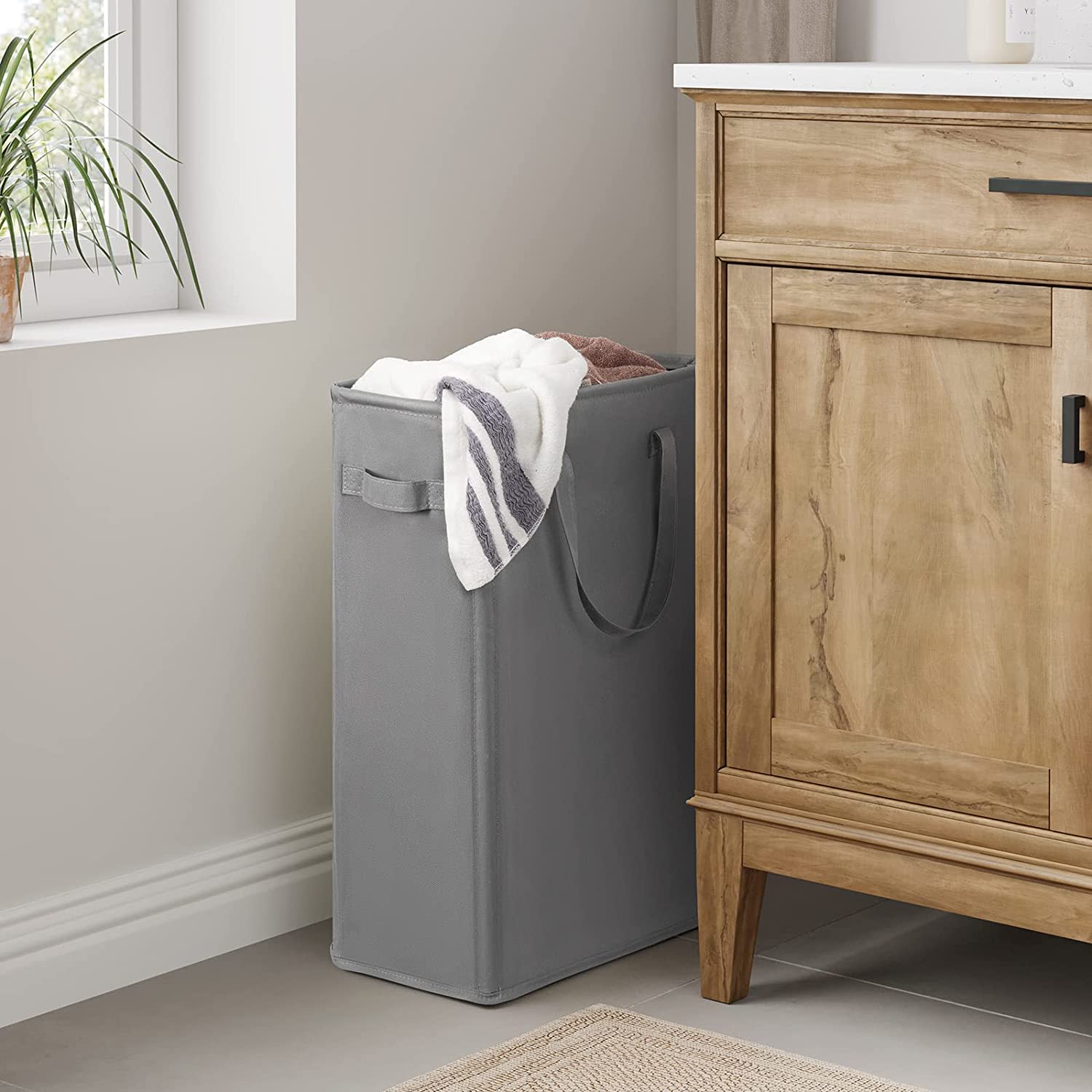 This Sleek, Slim 18 Laundry Hamper Is a MustHave for Super Small
