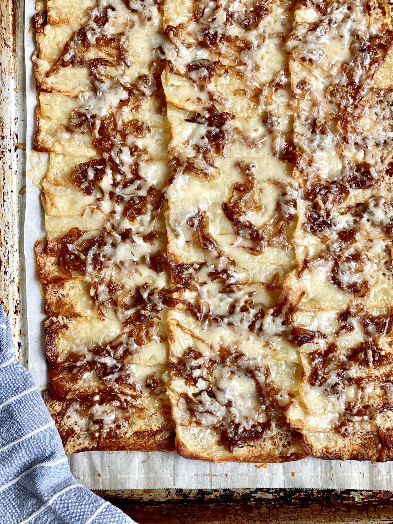 French Onion Domino Potatoes Are Crispy, Crunchy, Cheesy, and Practically Perfect