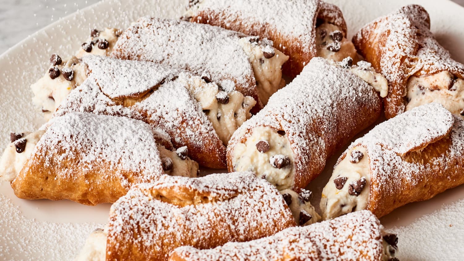 Cannoli Recipe Kitchn Wrap around a cannoli form, use prepared egg replacer to seal it around the tube, and fry in hot oil until brown, about a minute. cannoli recipe