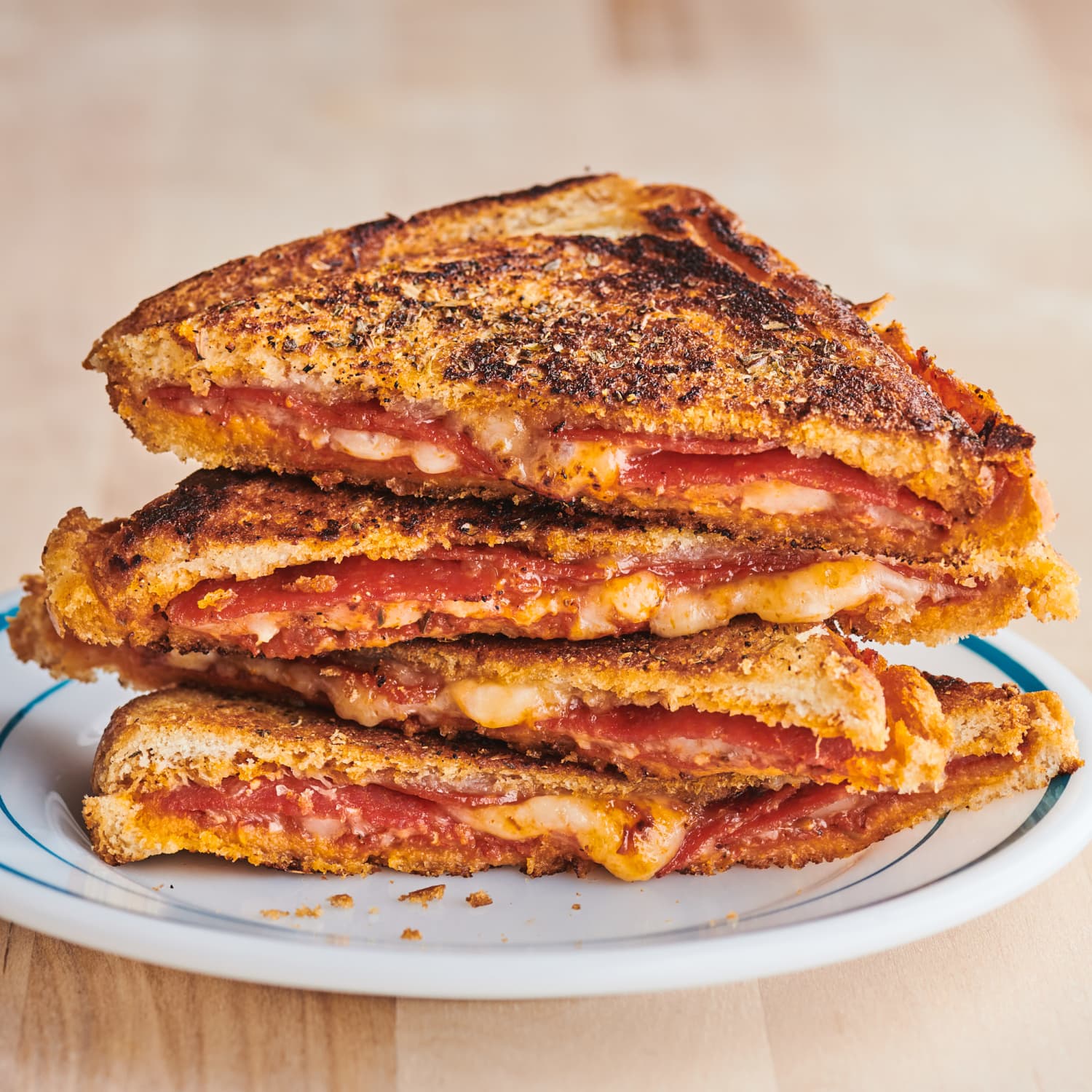 Cast Iron Pressed Pizza Sandwiches Kitchn These are hands down the greatest sandwiches of all time. cast iron pressed pizza sandwiches