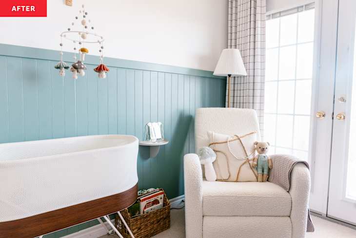 Nursery nook in bedroom with bassinet and white armchair