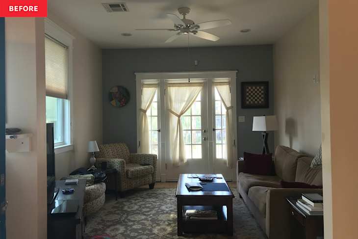 Blue wall in living room before renovation.