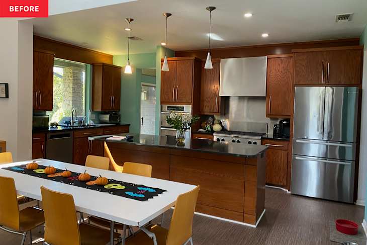 Wooden cabinets in kitchen before renovation.