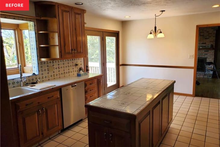 Tiled island in kitchen before renovation.
