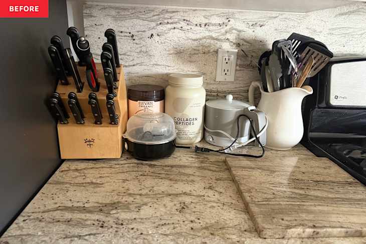 Wooden knife block with black knives, containers of collagen peptides and organic powder, utensils in a pitcher, and a kettle.