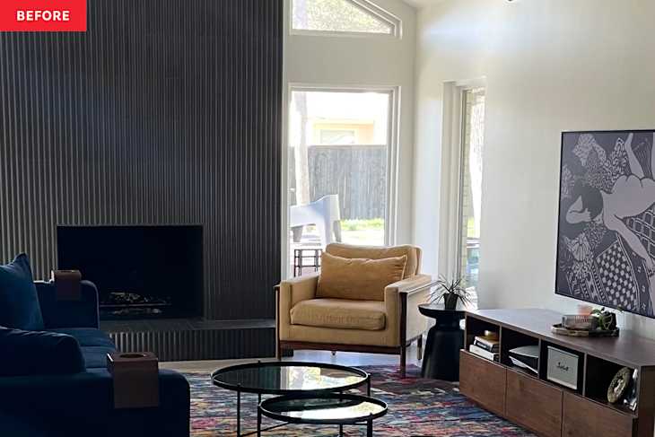 Living room with a blue sofa, yellow armchair, glass coffee table, and a TV on a wooden stand.