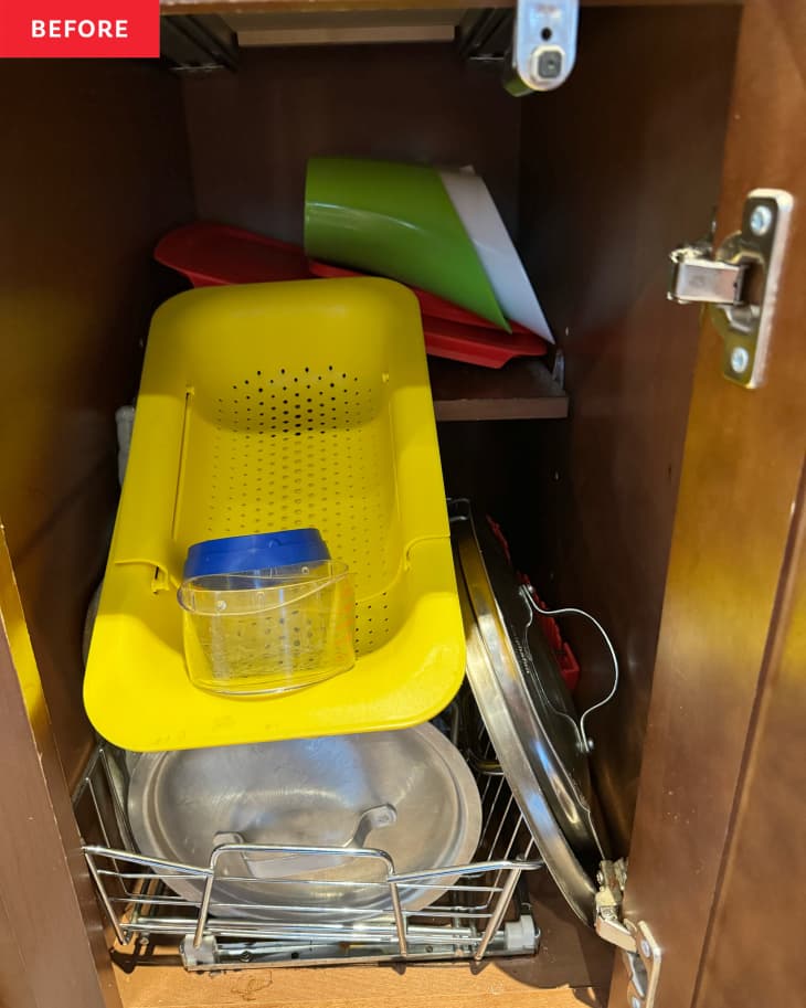 Items in kitchen cabinet before decluttering.