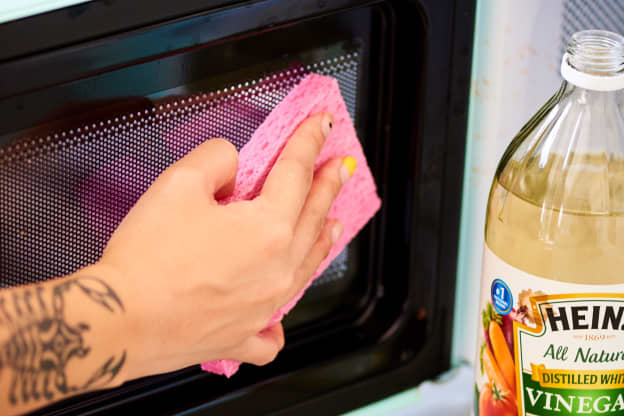 6 Mistakes You're Making When Cleaning Your Microwave, According to the Pros