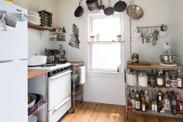 This Brilliant Organizer Creates Tons of Extra Storage on the Outside of Your Fridge