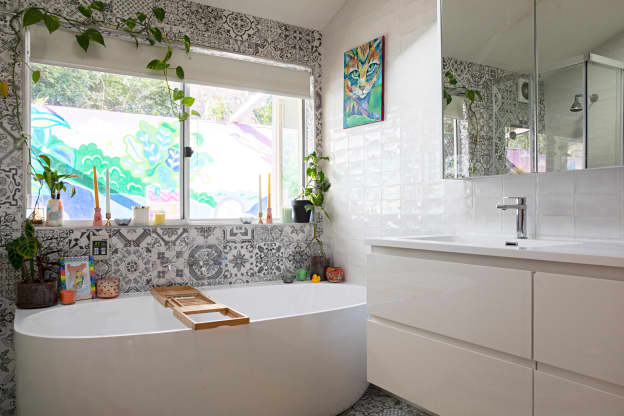 The Versatile Spray Mop That Keeps Bathroom Tiles, Floors, and Windows Spotless (It's Only $40!)
