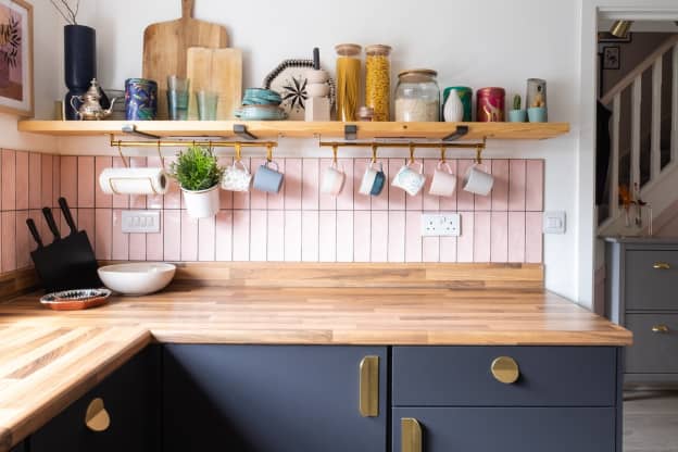 A $9 IKEA Gem Added the Perfect Finishing Touch to This DIY Open Shelving