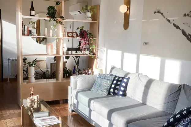 This Apartment's Cool Dining Table Looks Like Concrete (but Is Something Else!)