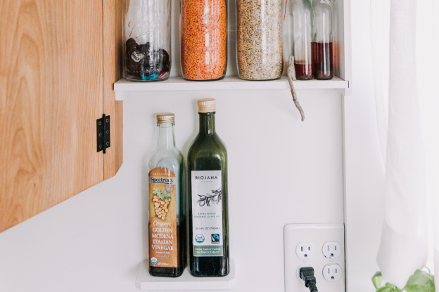 6 Smart Ways to Store All of Your Oil and Vinegar Bottles, According to Pro Organizers