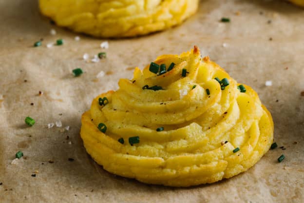 Cheesy Garlic Duchess Potatoes Are the Fancy French Side You Need