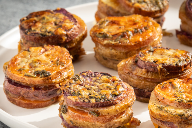 These Festive Rainbow Potato Stacks Are Filled with Cheese, Butter, and Herbs