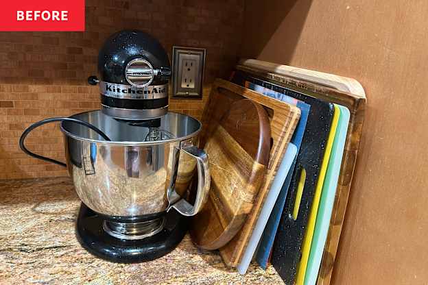 My Mom Just Gave Me the Smartest $15 Kitchen Cabinet Organizer for Corralling Cutting Boards