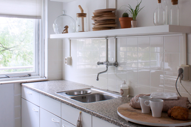 The Super Smart Way to Clean That Gross Grate at the Bottom of Your Sink