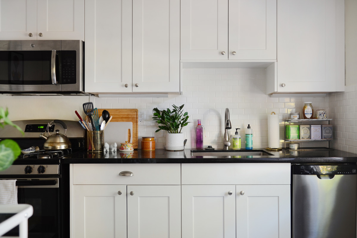 This Ingenious Organizer Turns That Wasted Space Under Your Cabinets into Extra Storage