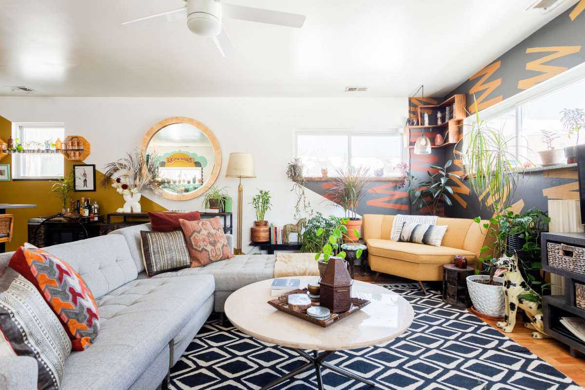 A Mural-Filled Chicago Rental Has One of the Best Plant Hanging Ideas We've Seen in a While