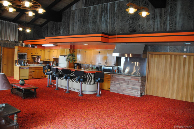 This Unassuming House Has a Bowling Alley and Blazing Orange Carpets Inside