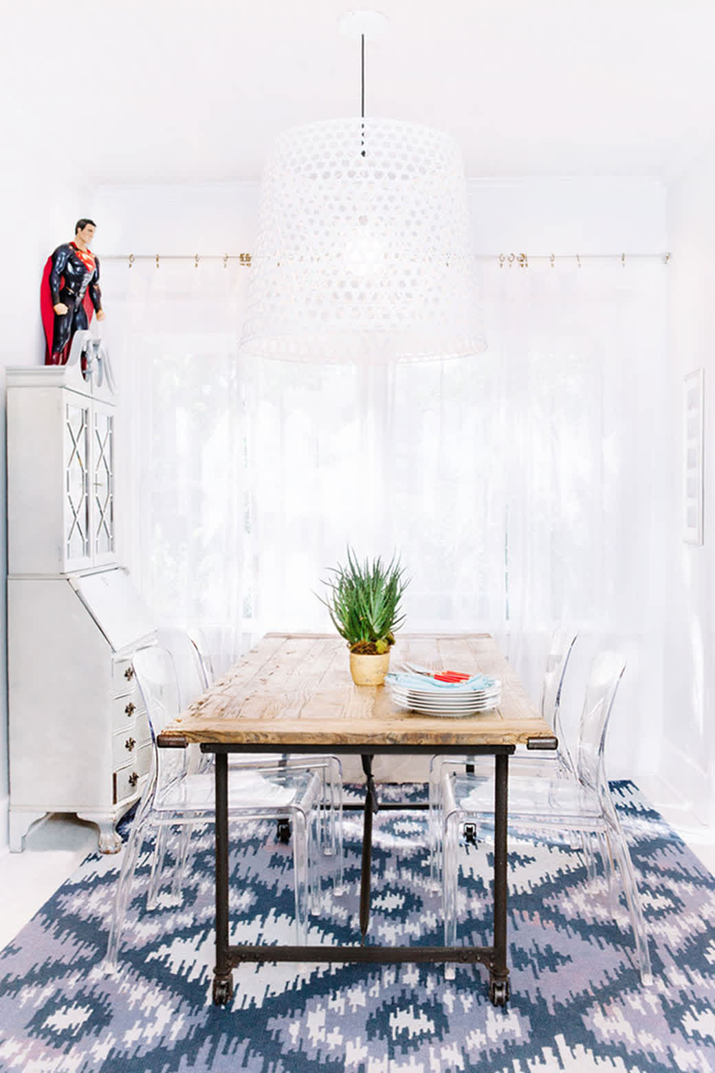 Does a Rug Belong Under a Dining Table? Here's How to Tell.