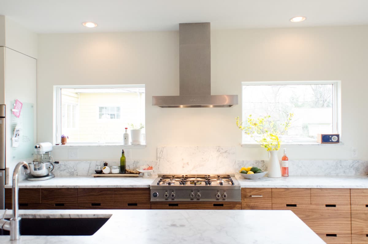 Warm White Kitchen with Wood Island - Maison de Pax