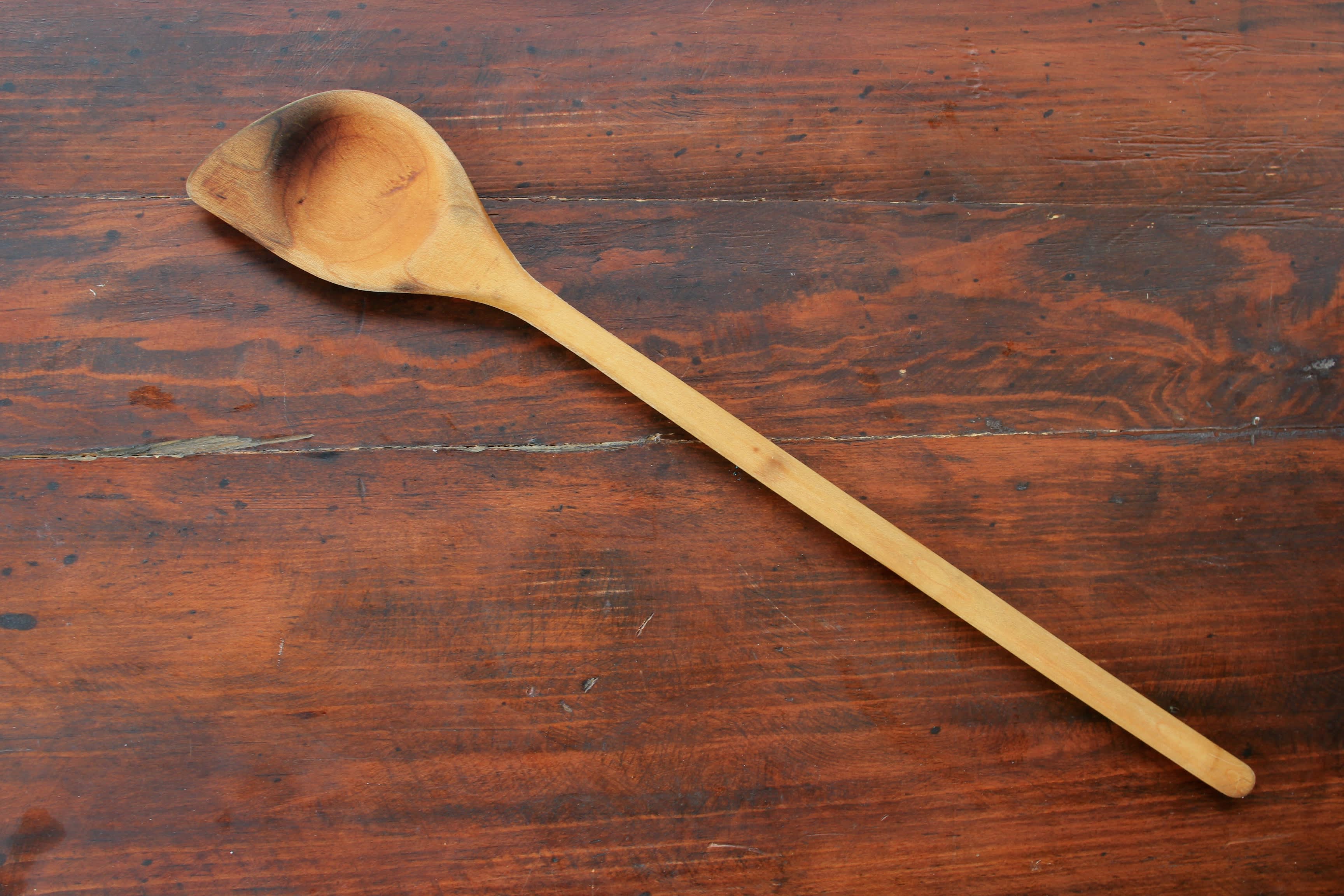 curved wooden spatula