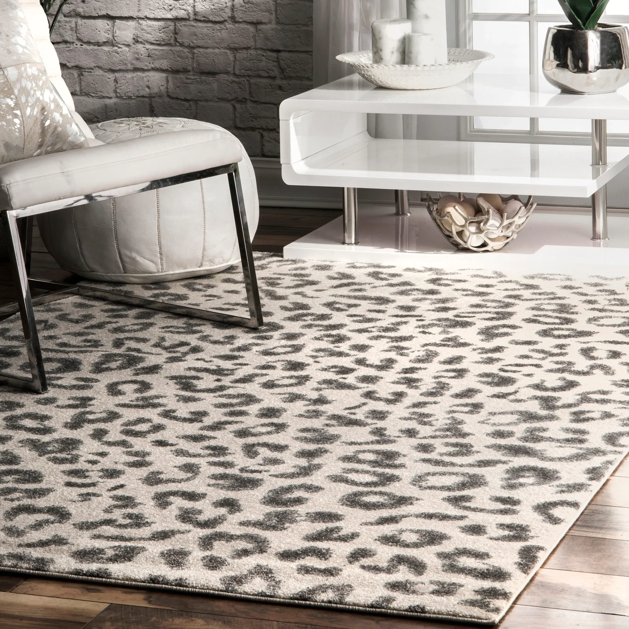 https://cdn.apartmenttherapy.info/image/upload/v1558706583/at/news-culture/2019-05/nuLOOM-Grey-Modern-Leopard-Spotted-Area-Rug-af115aec-5c63-4ced-9242-15ee77f453ee.webp