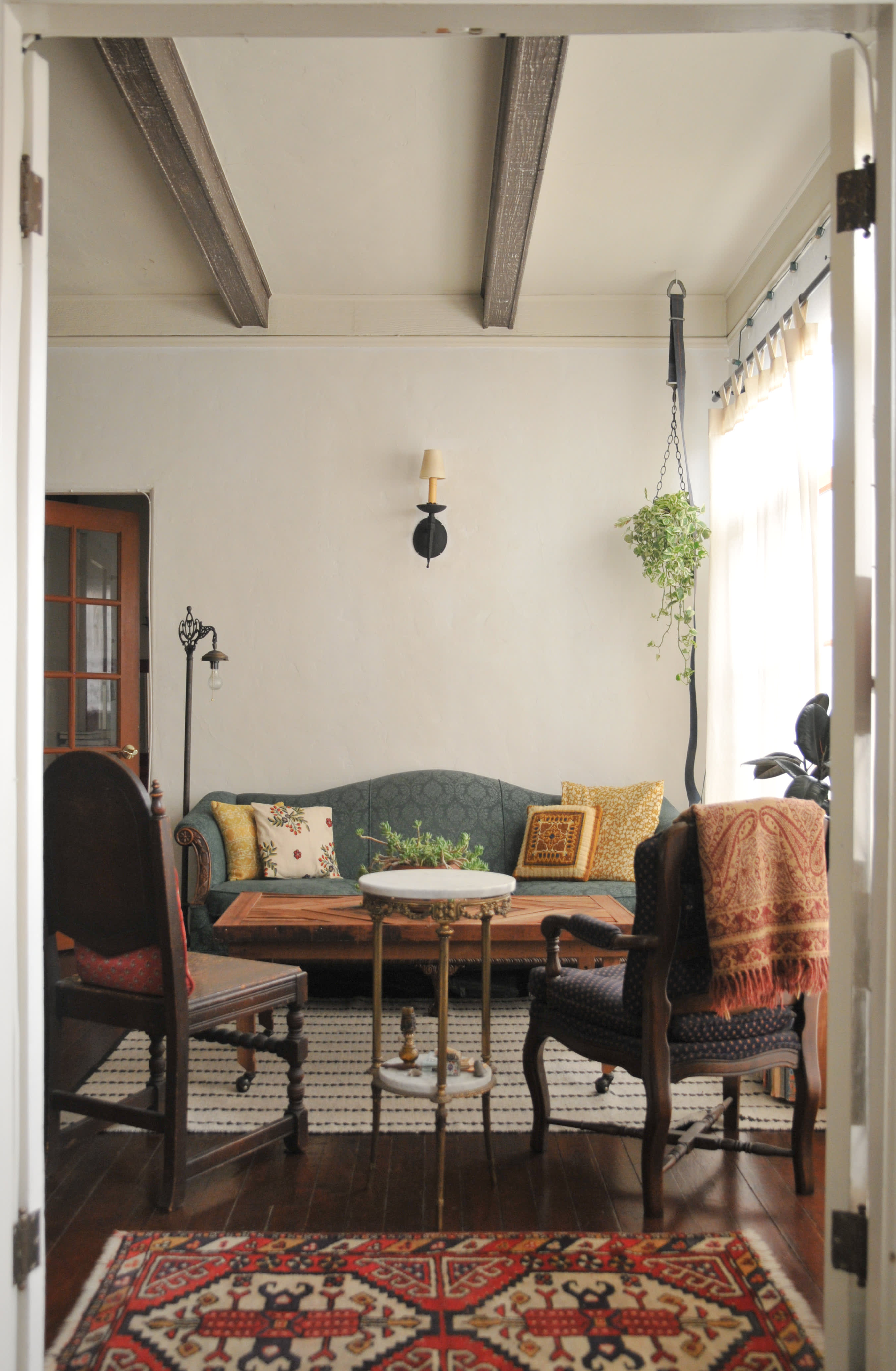 A Spanish Style LA Apartment Full of Warm Wood & Salvaged Finds