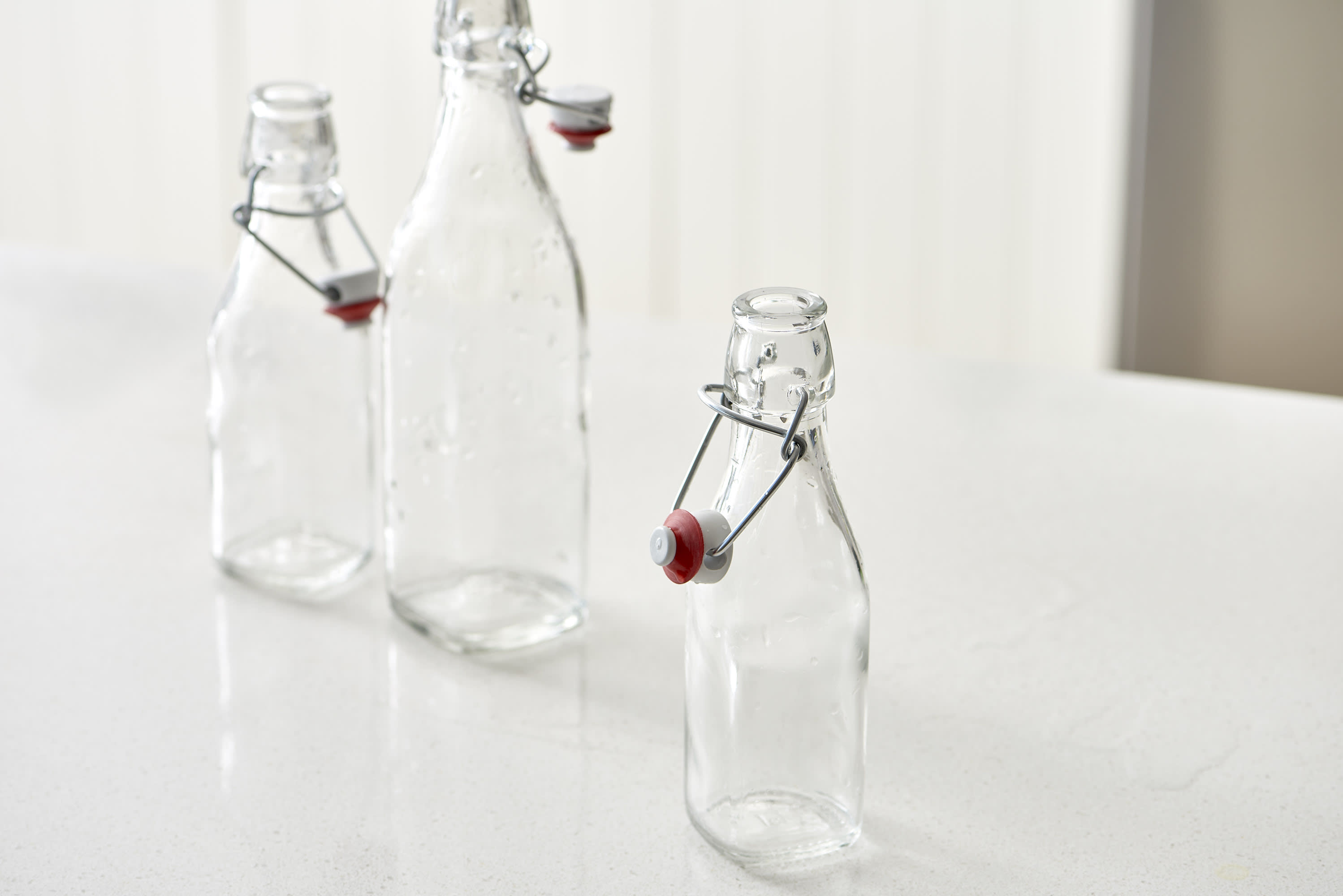 The Trick Bartenders Use to Clean Out Glass Bottles