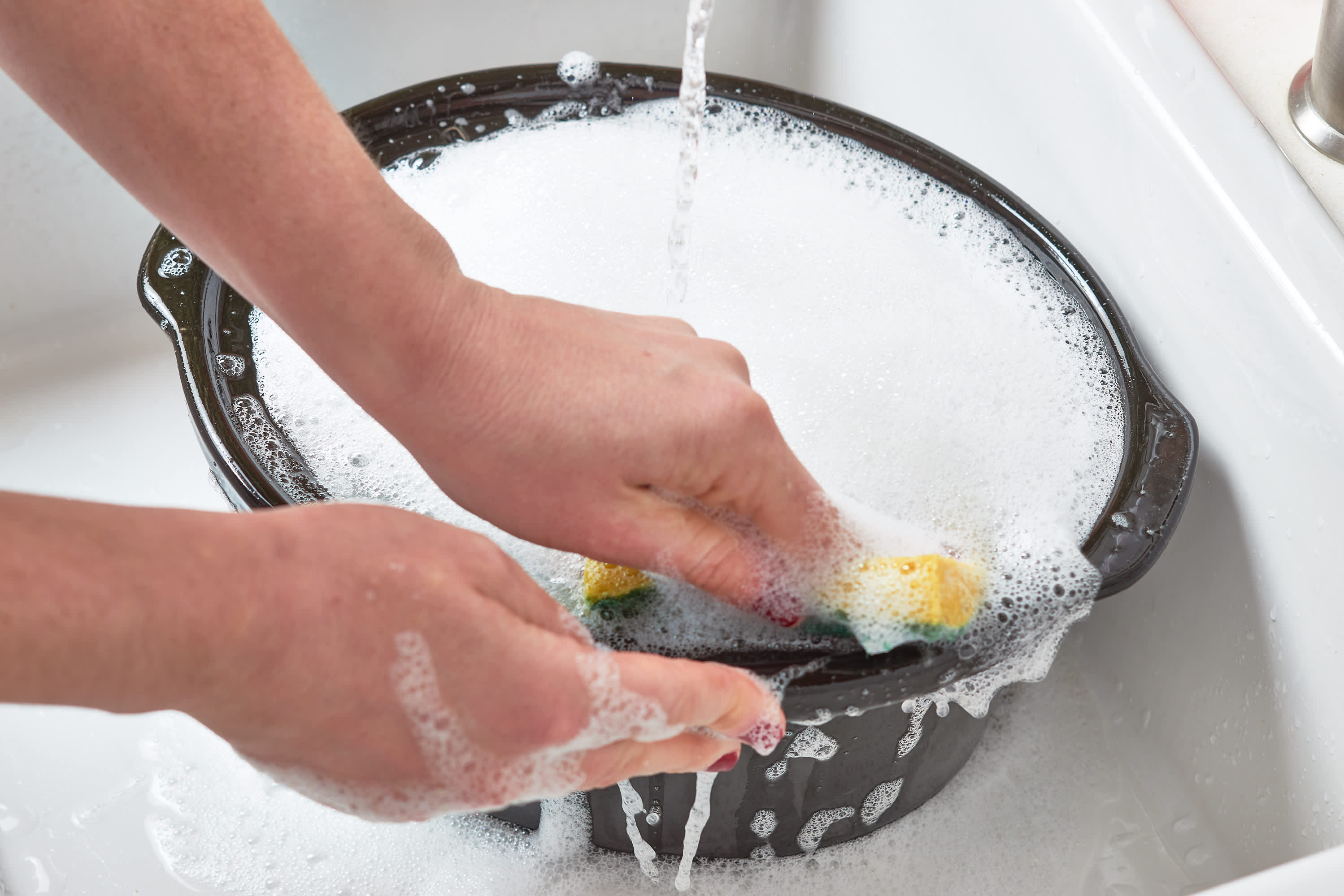 How to Wash Dishes by Hand Until They're Sparkling Clean
