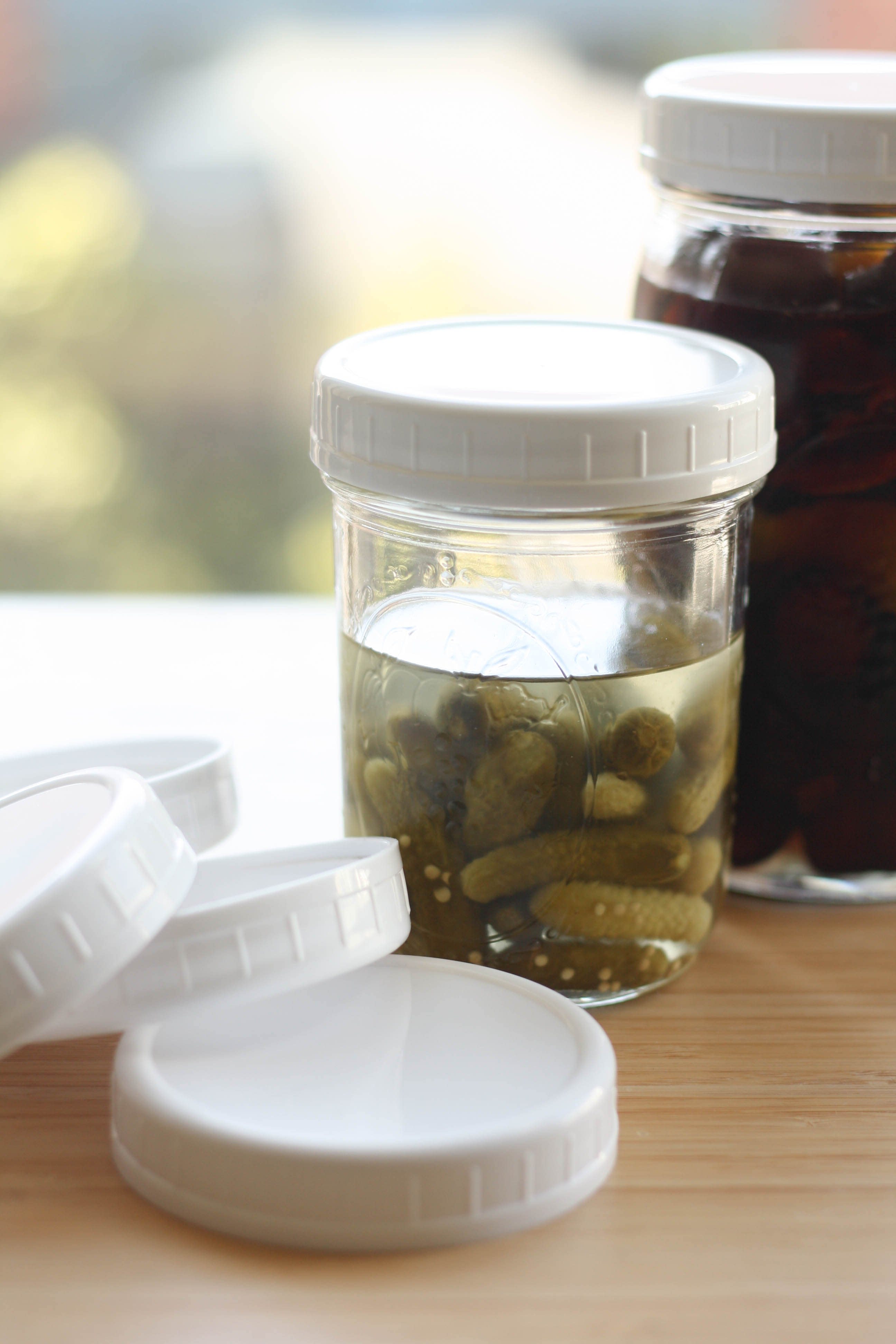 Is It Ever Okay To Use Plastic Caps When Canning At Home?