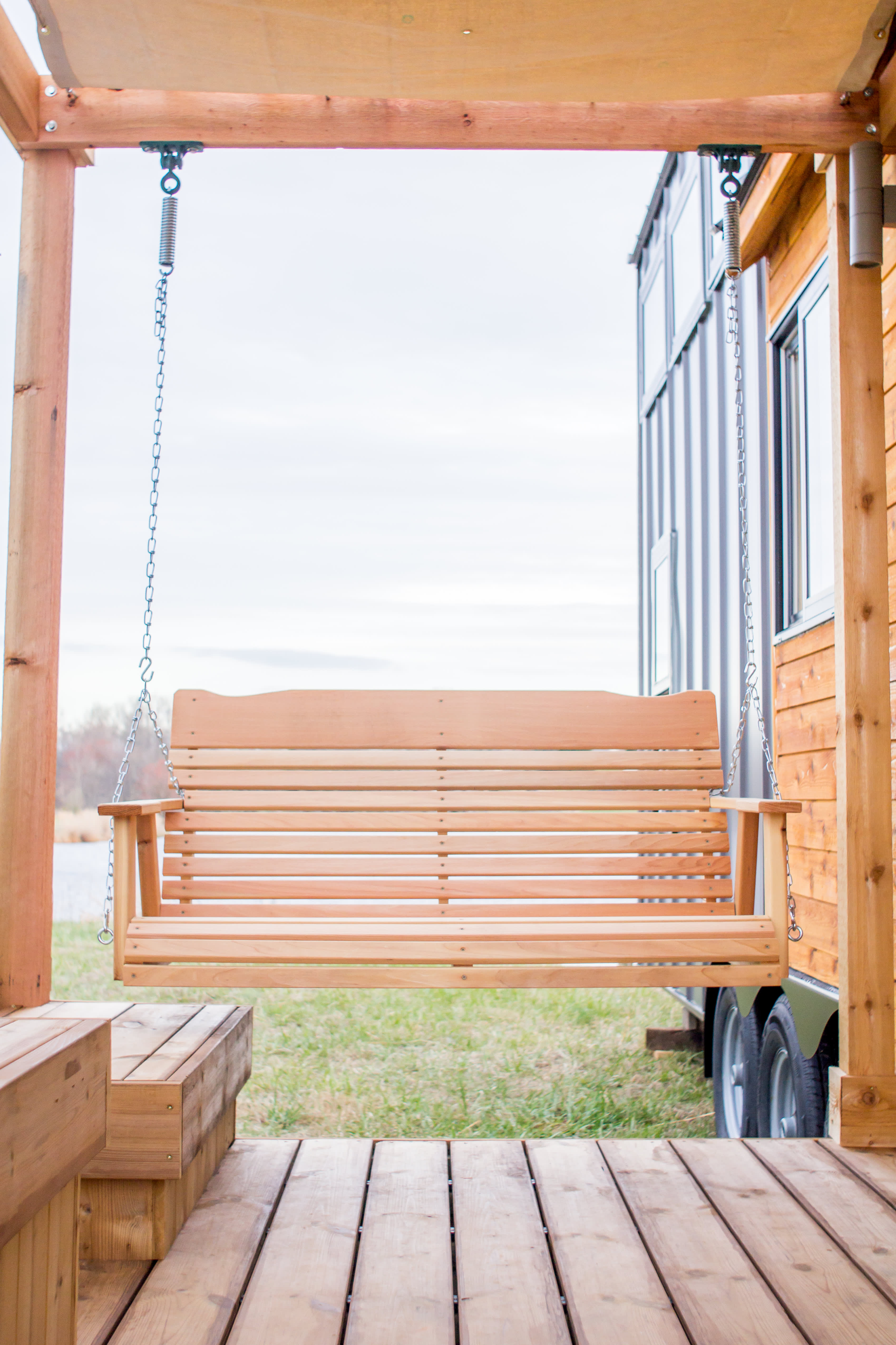 Tiny house comes with a greenhouse and porch - Curbed