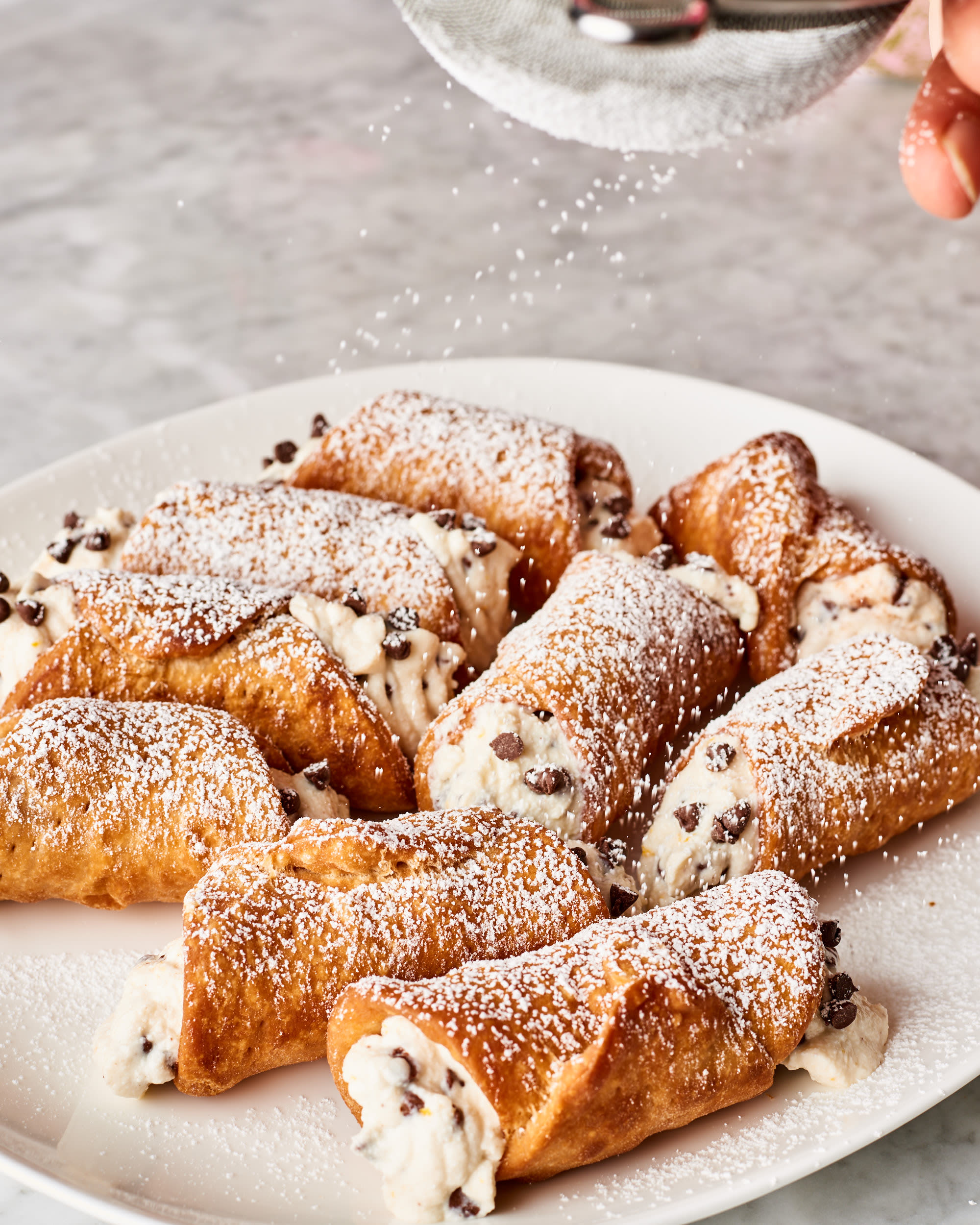How to make delicious cannoli with authentic DIY wood cannoli rollers.