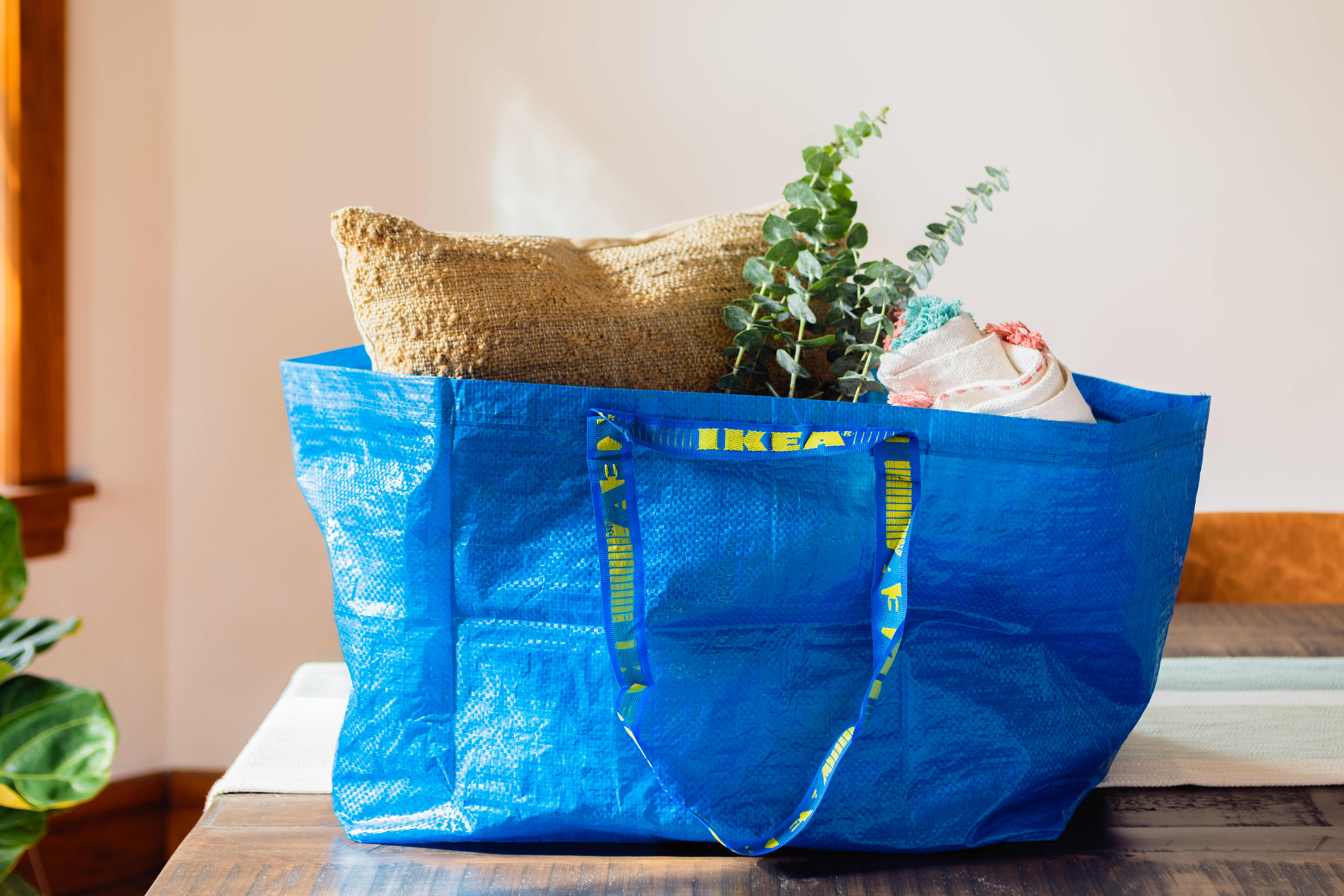 Ikea's blue bag gets even bigger in a pair of oversized campaigns