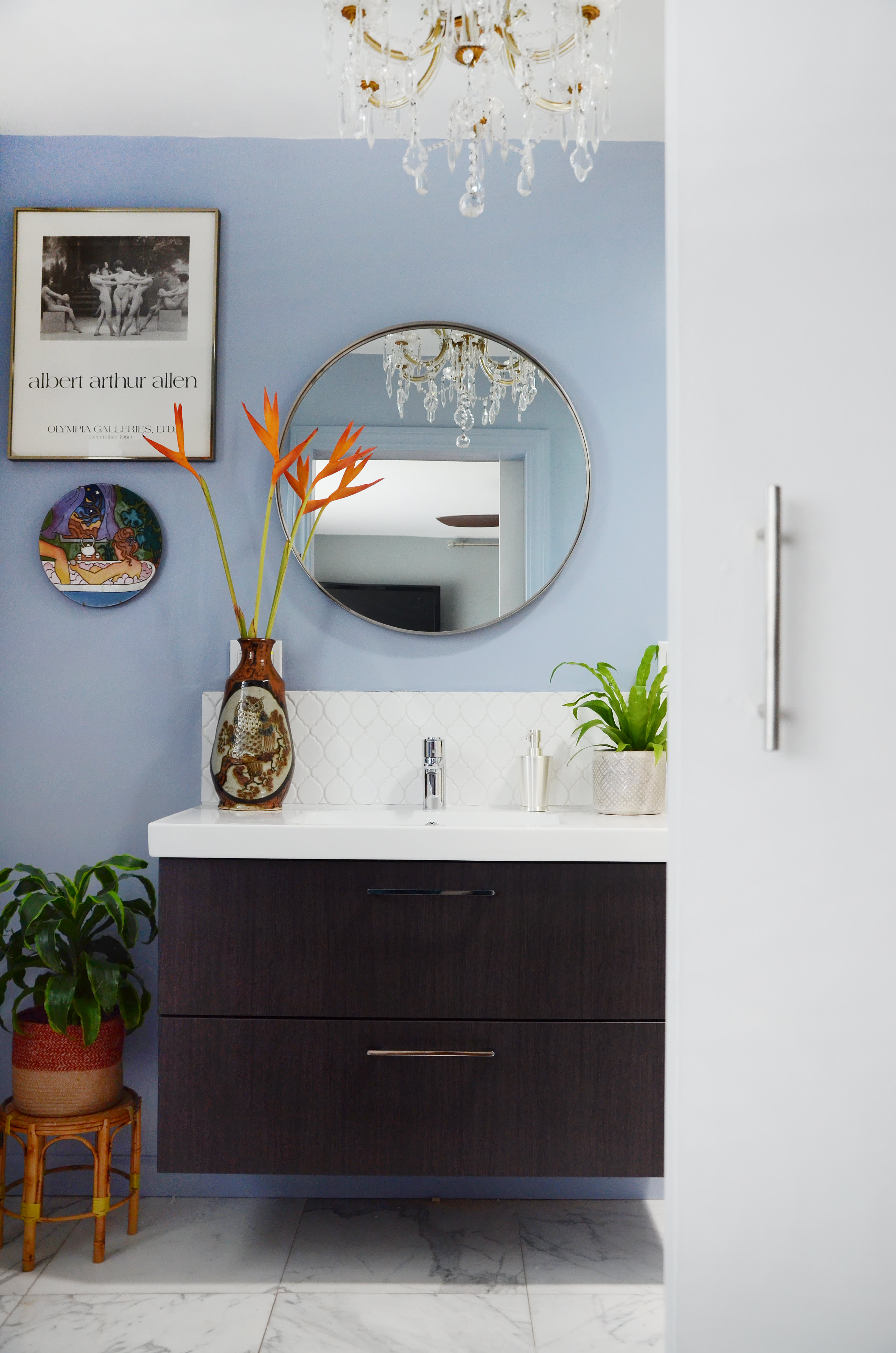 chandelier over bathroom vanity