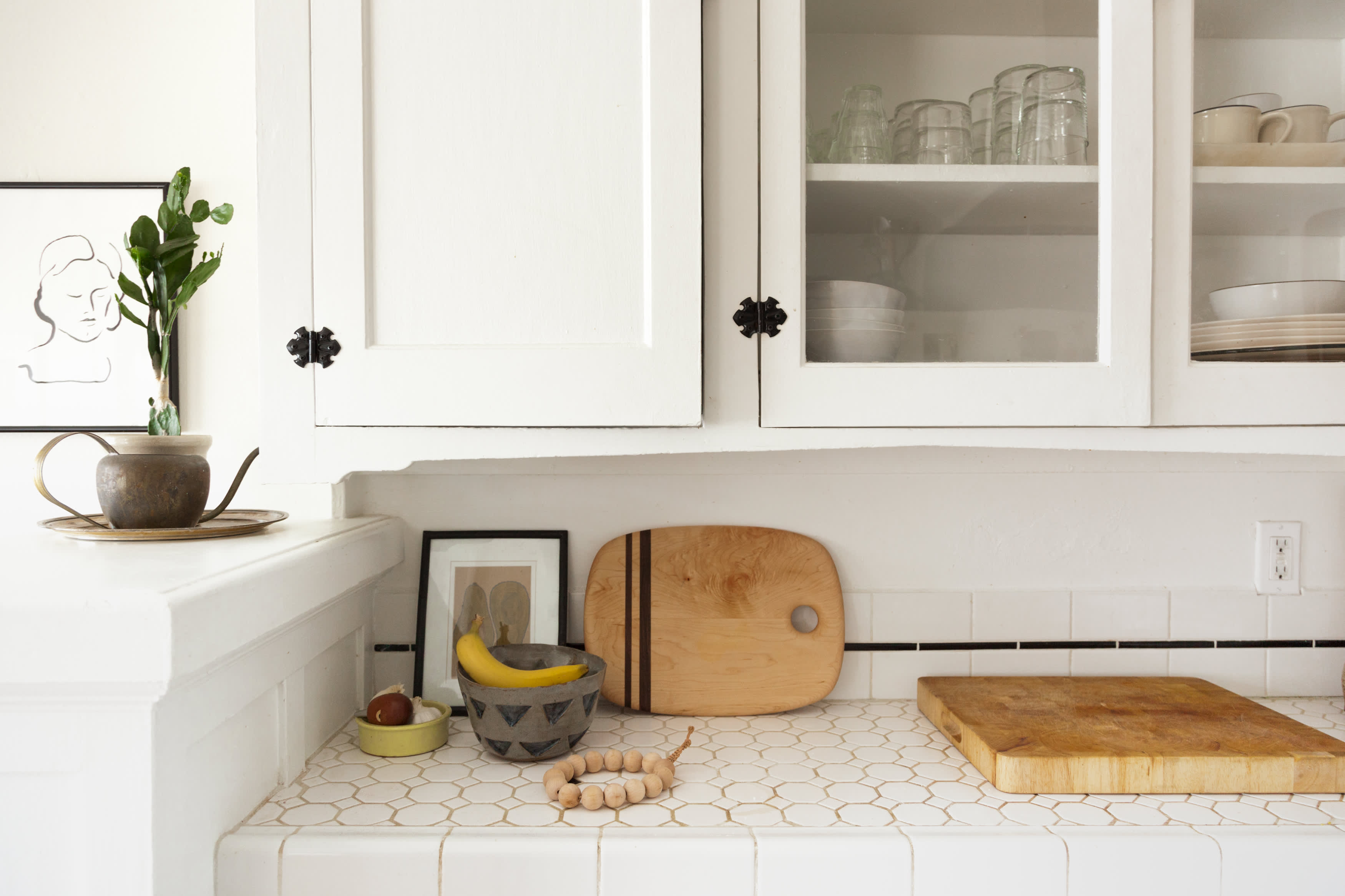 Here's What That Pull-Out Board In Your Kitchen Is Really For