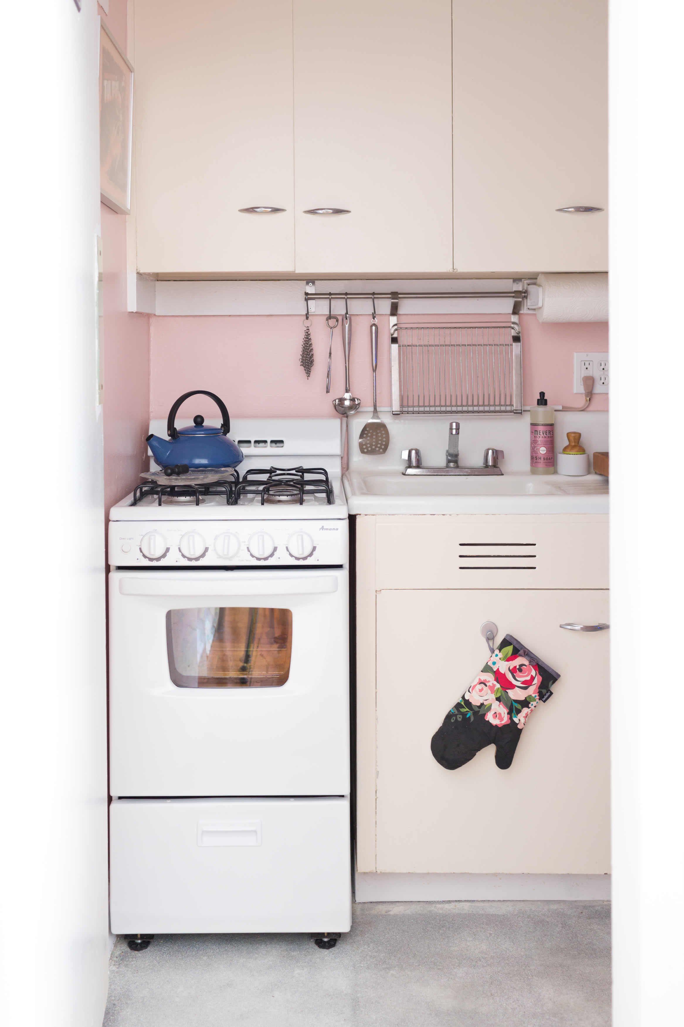 Tiny Home With Retro Style Pink kitchen appliances