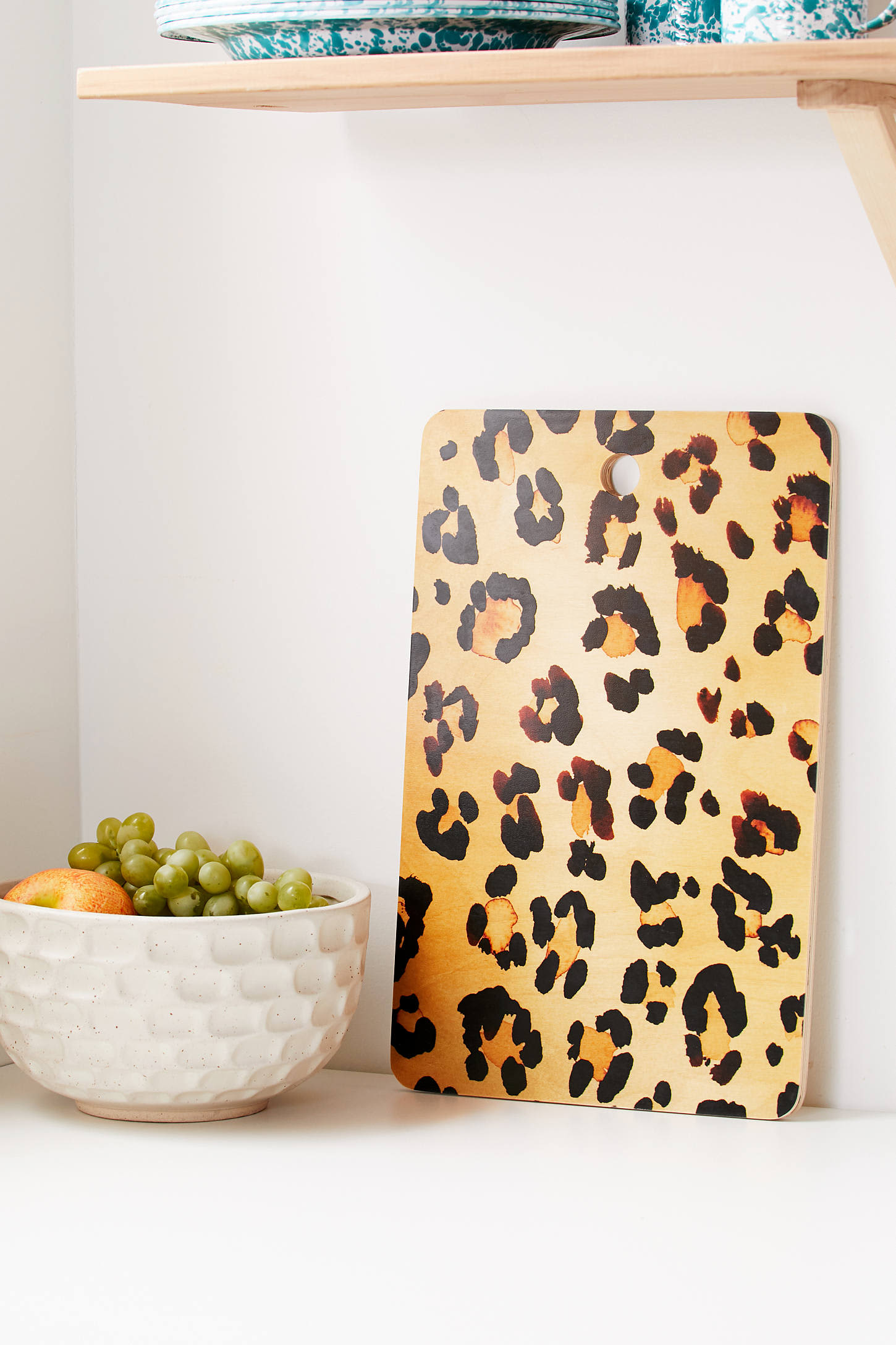 https://cdn.apartmenttherapy.info/image/upload/v1567864442/at/amy-sia-leopard-cutting-board.jpg